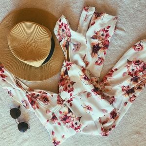 NWT Beautiful Floral Jumpsuit with Ruffle Sleeves